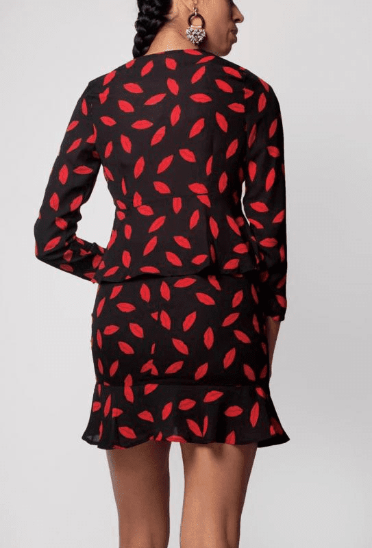 Set De Blusa Y Minifalda Color Negro Diseño Besos. 100%Polyester